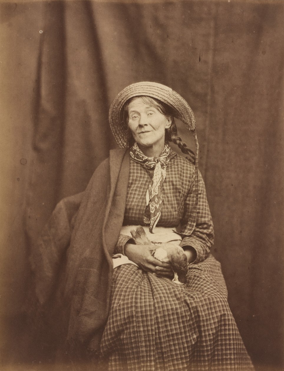 Kvinna som håller en död fågel, Surrey County Asylum av Dr. Hugh Welch Diamond