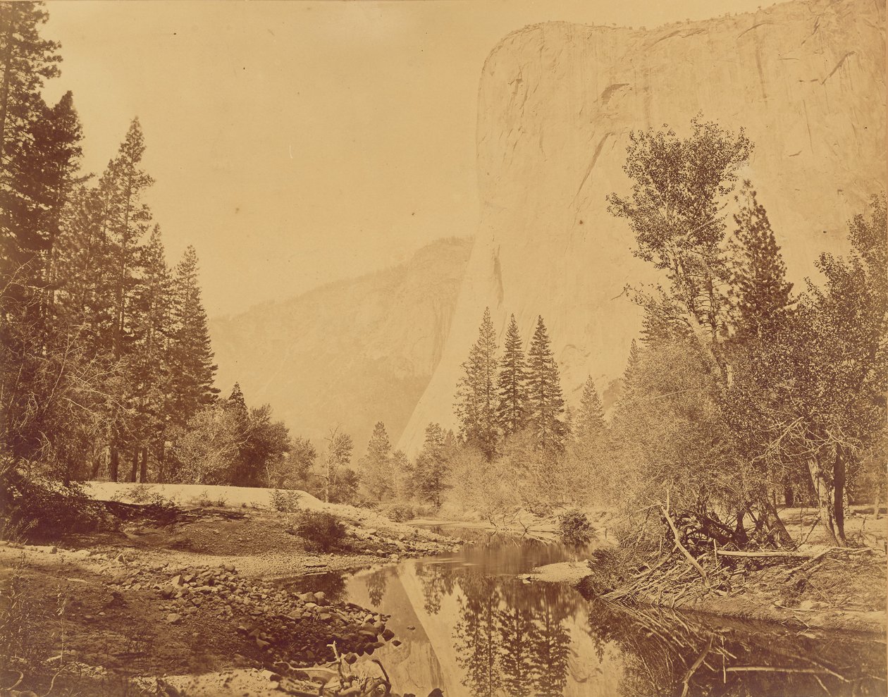 Tutokanula. Yosemites dal. (Den store hövdingen) "El Capitan." 3500 fot hög. av Eadweard J. Muybridge