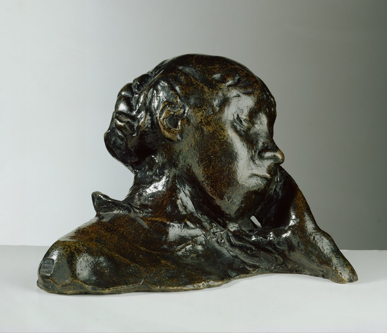 Porträtt av en kvinna med huvudet stöttat av vänster hand (brons) av Edgar Degas