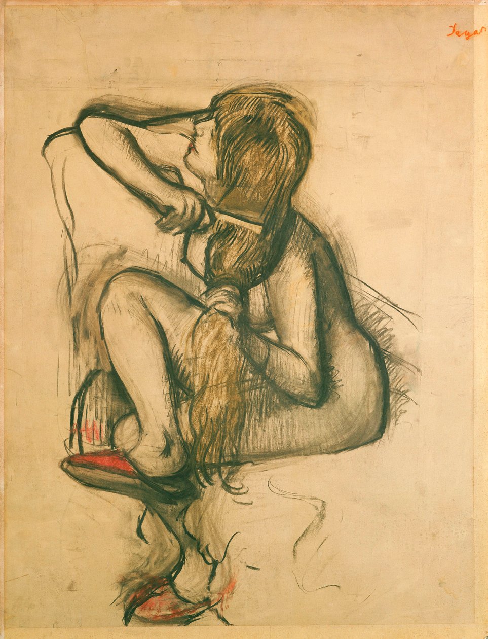 Kvinna som kammar sitt hår av Edgar Degas