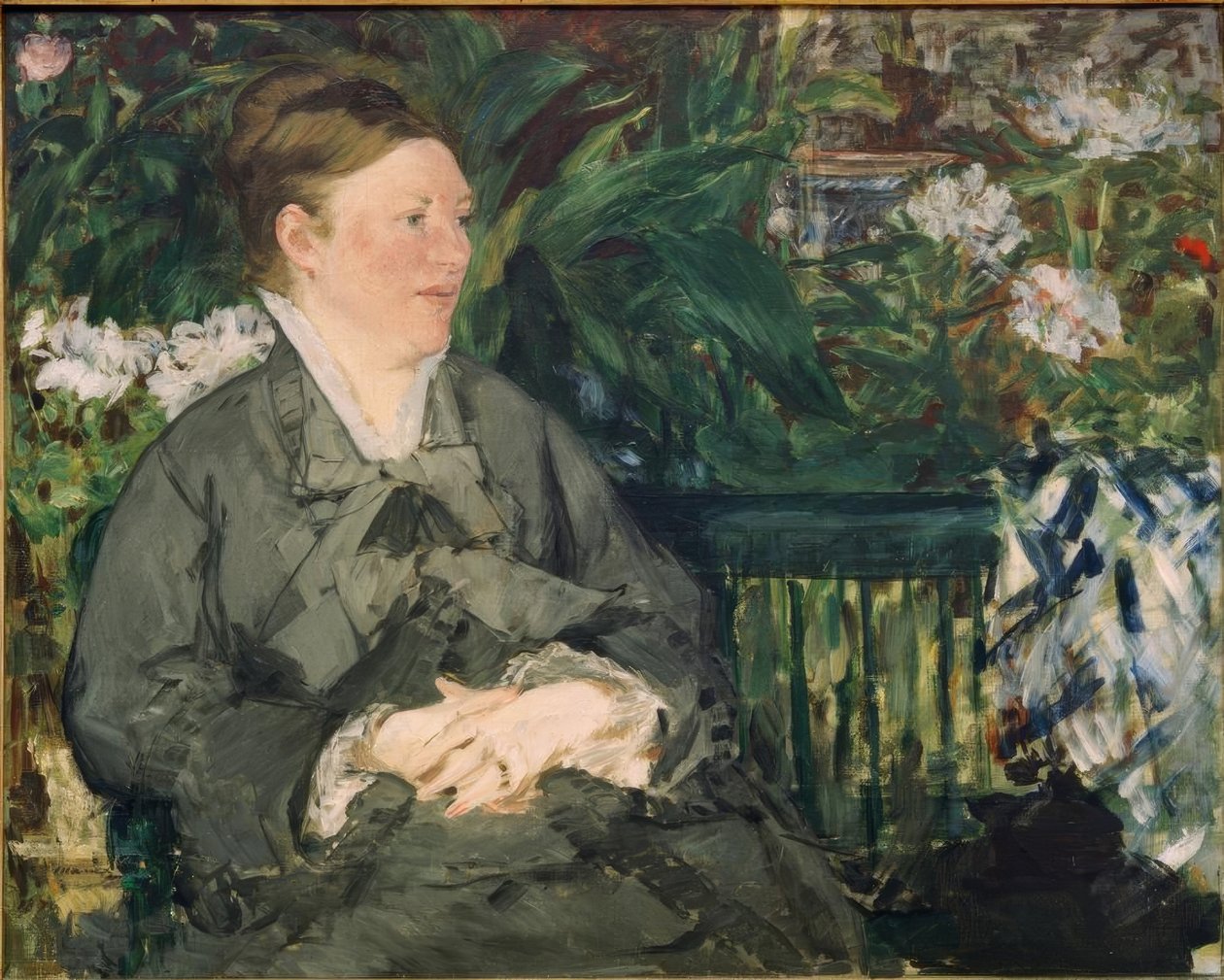 Porträtt av Madame Manet i växthuset av Édouard Manet