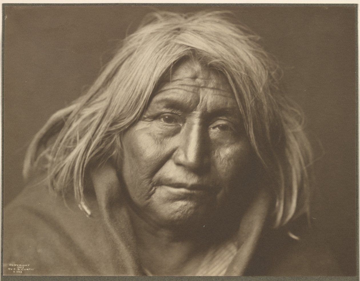 [En apach] av Edward S. Curtis