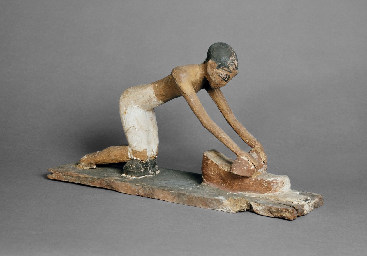Modell av en kvinna som maler majs, egyptisk, hittad i Sidmant (polykromt trä) av Egyptian 6th Dynasty