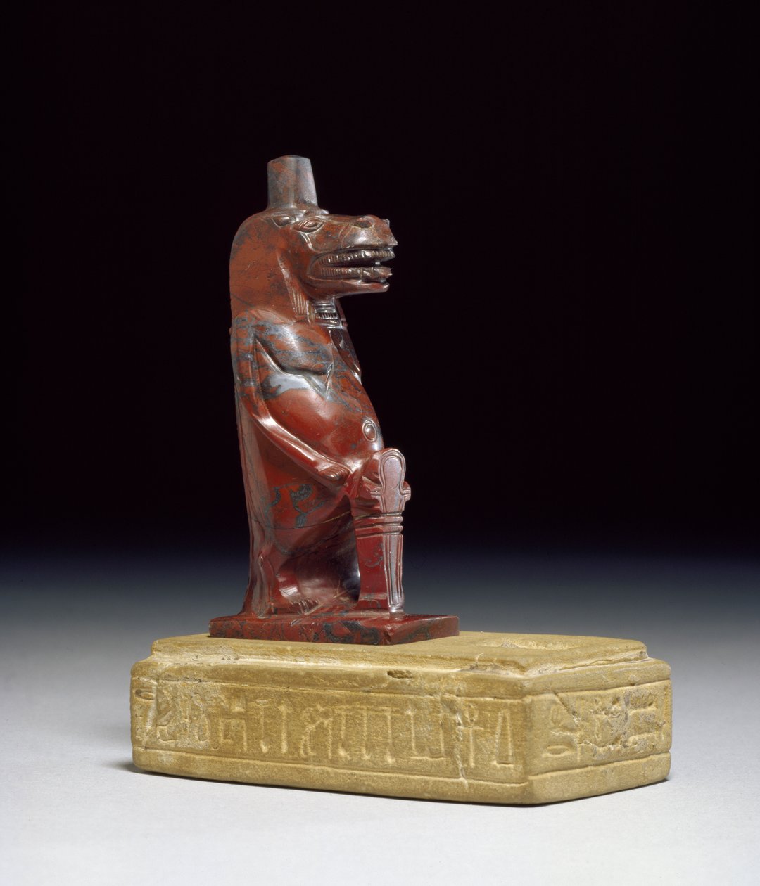 Flodhästgudinnan Taueret, som håller en fläta av rullad papyrus som bildar det skyddande hieroglyftecknet, 