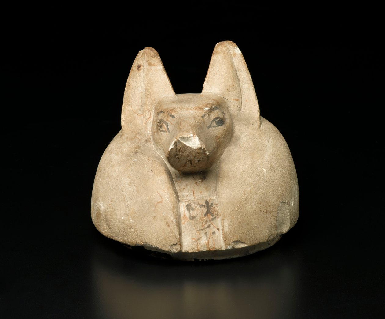 Jackal-headed lock av en baldakinburk (kalksten) av Egyptian