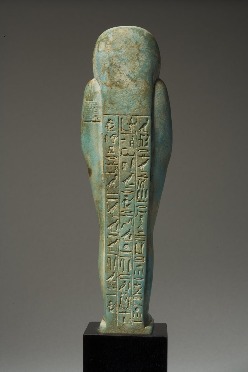 Bakifrån av en Ushabti-figur för Hor-Khebi, sen dynastisk period, sent 25:e-tidigt 26:e dynastin, c.700-600 f.Kr. (fajans) (se 270353 för framsidan) av Egyptian