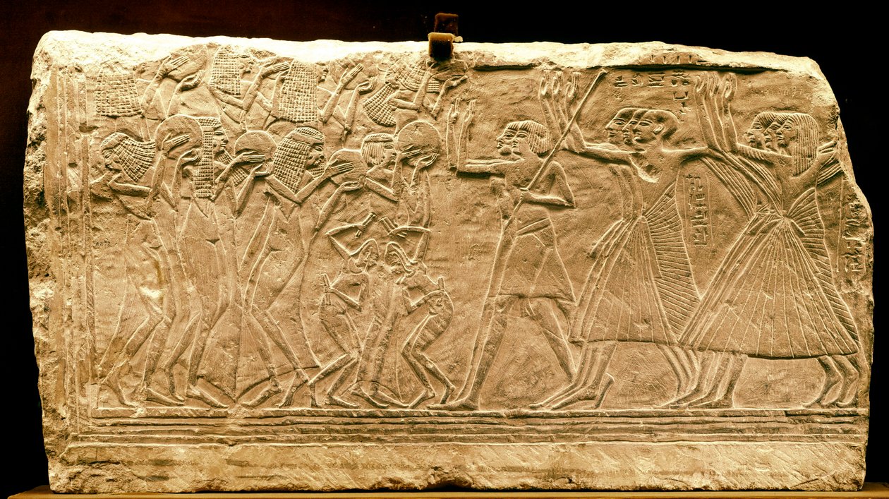Forntida Egypten: lågrelief som representerar en procession med dansare. Nytt imperium. Regne av Ramses II. 1300-talet f.Kr. Kairo museum. Egypten av Egyptian 18th Dynasty