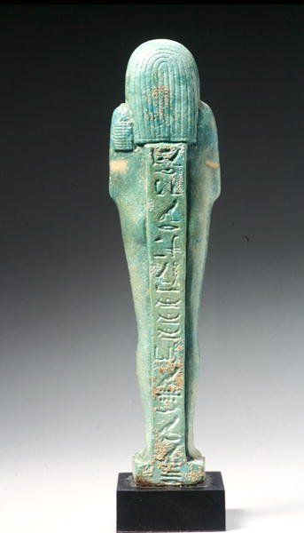 Bakifrån av en Ushabti-figur för Nakht-Hor-em-heb-mes-em-khereden, sen dynastisk period, c.600 f.Kr. (fajans) (se 241439 för framsidan) av Egyptian 26th Dynasty