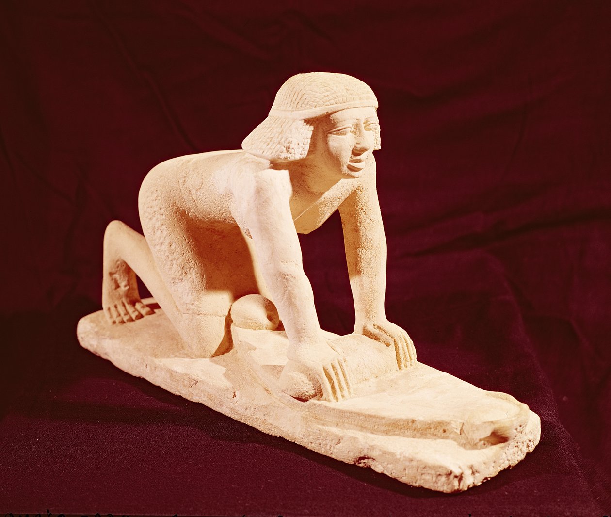 Modell av en tjänare som maler säd, Old Kingdom, från Saqqara av Egyptian 5th Dynasty