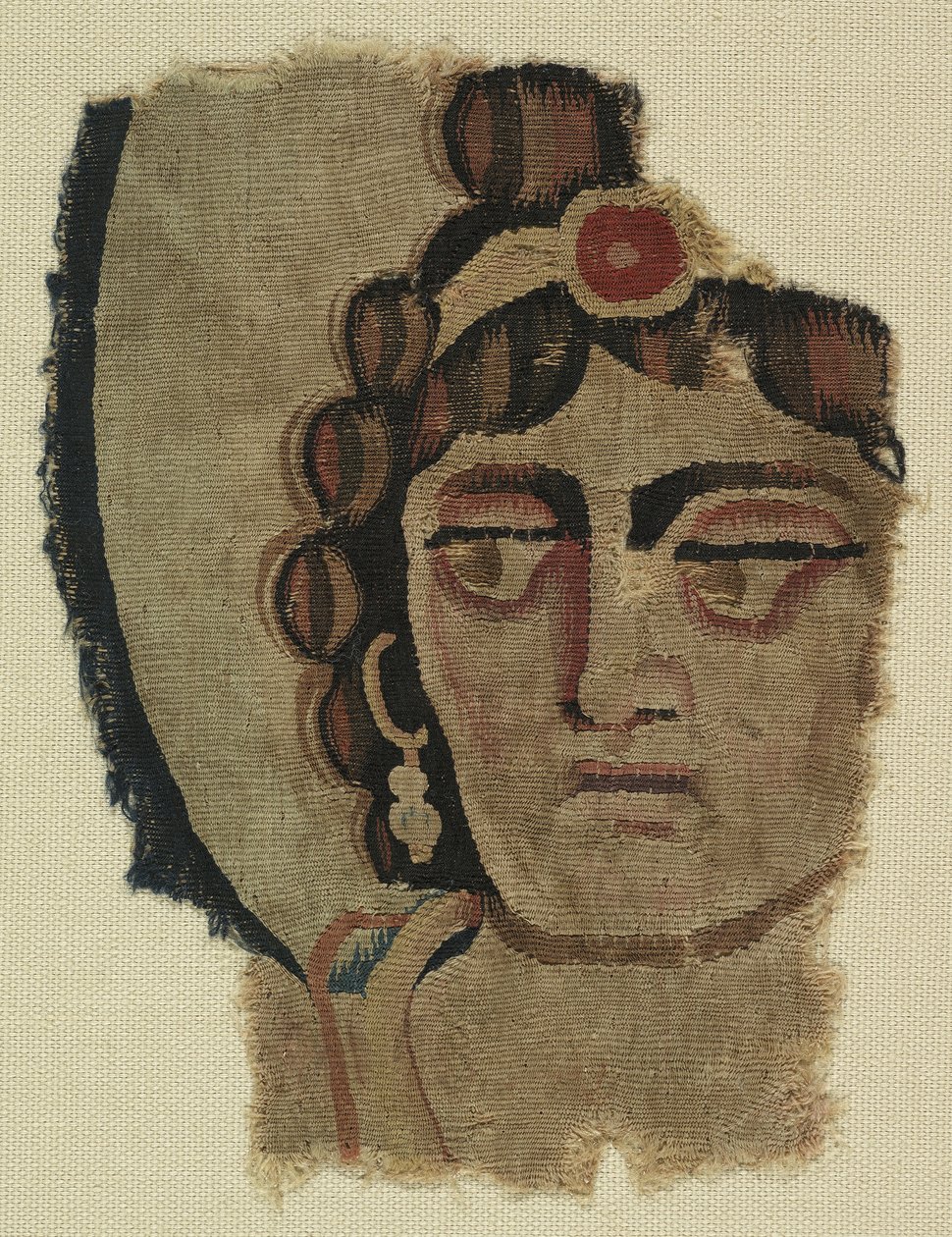Fragment av ett kvinnas huvud, koptiskt (textil) av Egyptian School