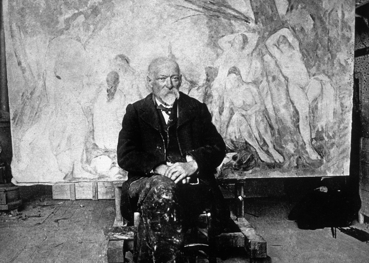 Paul Cezanne (1839-1906) fransk målare 1904 framför en av sina dukar som visar simmare (s/v foto) av Emile Bernard
