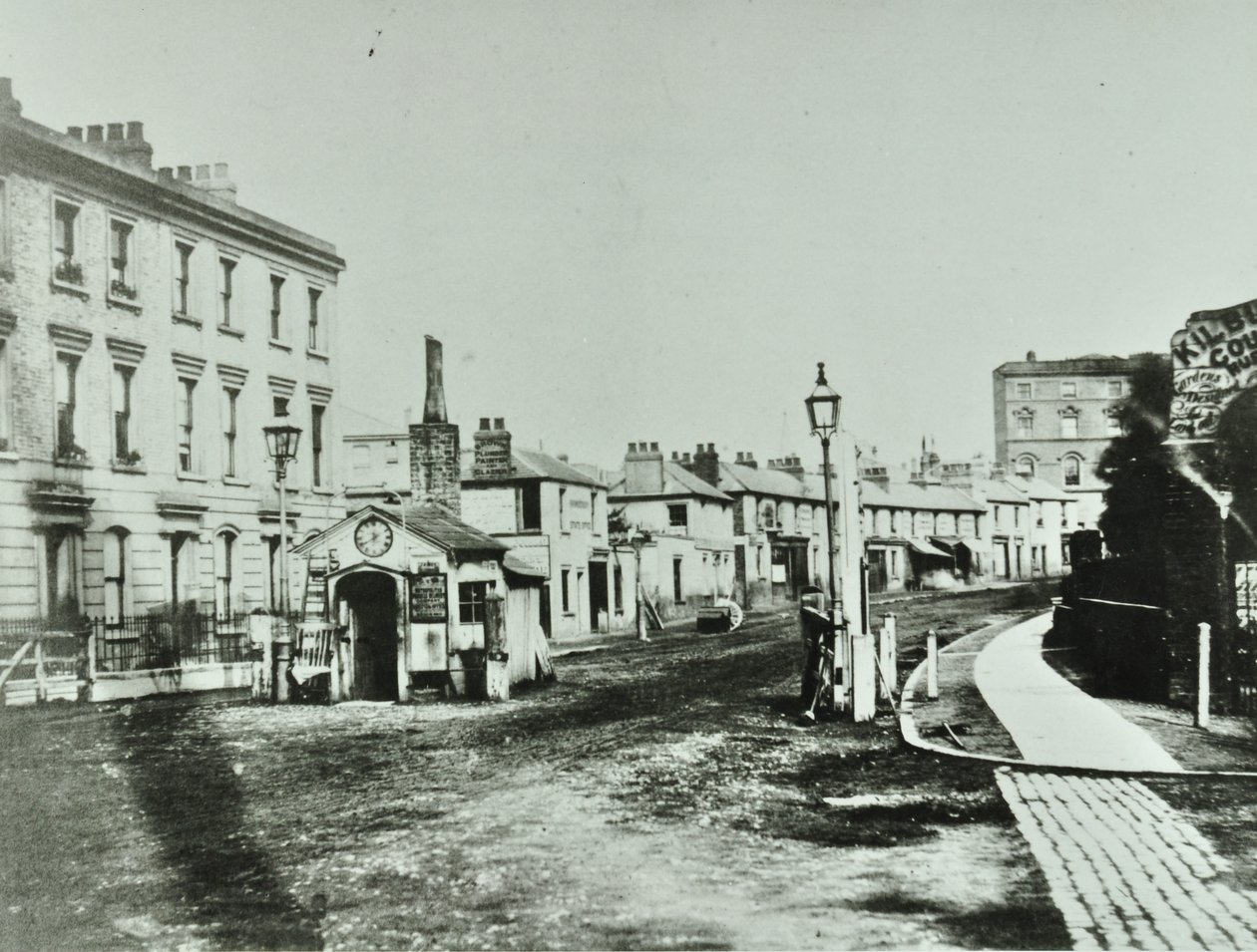 Kilburn Toll Gate vid södra änden av Kilburn High Road vid korsningen av Kilburn Priory, Camden Libraries, 1875 av English Photographer