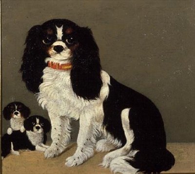 En Cavalier King Charles Spaniel med valpar (par 64046) av English School