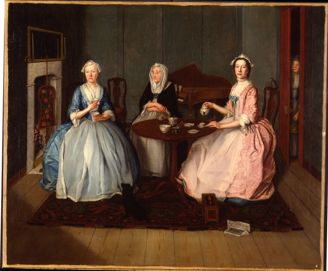 En familj i ett inre som tar te, c.1740 av English School
