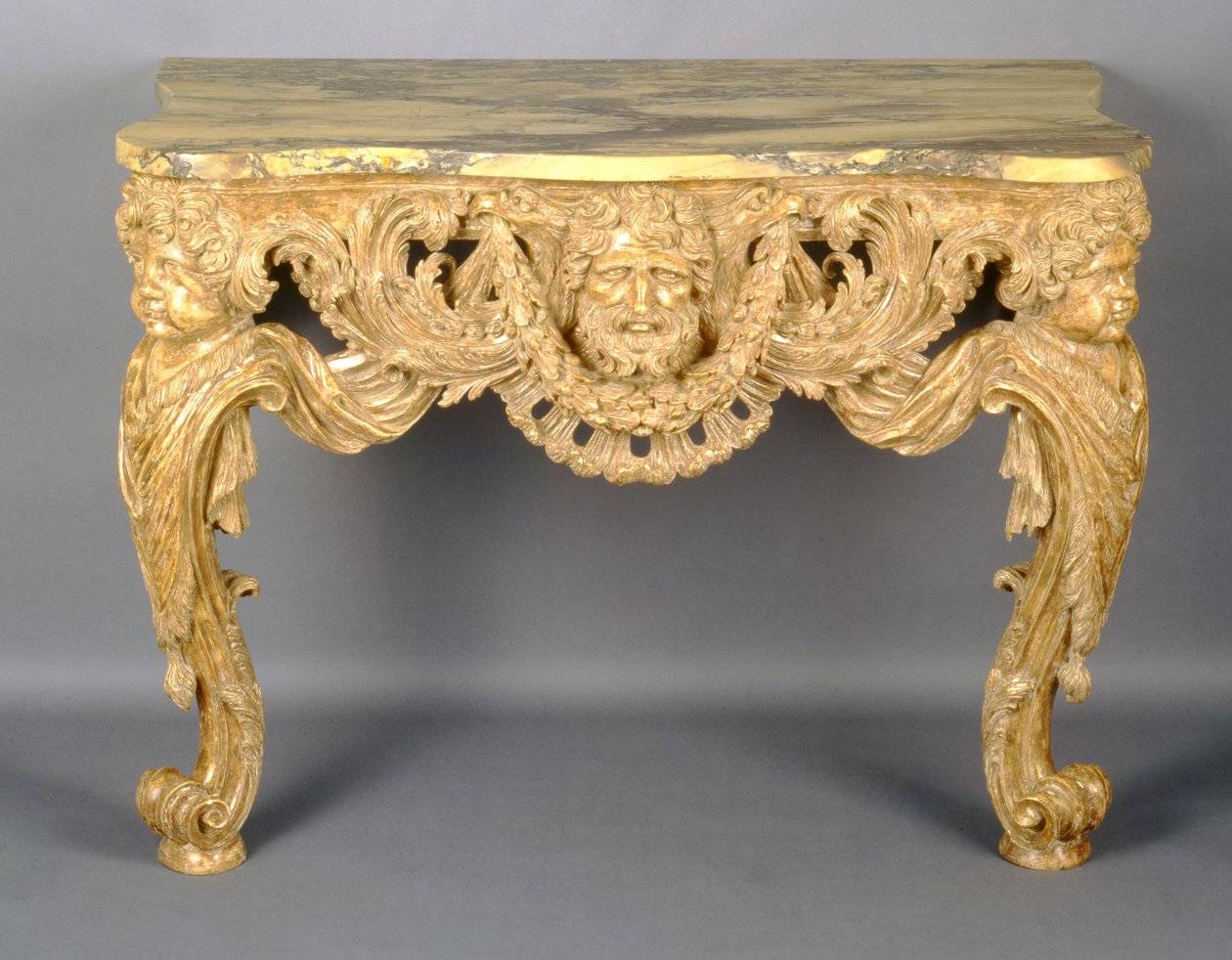 Ett konsolbord från George II, ca 1740 (snidat förgyllt trä) av English School