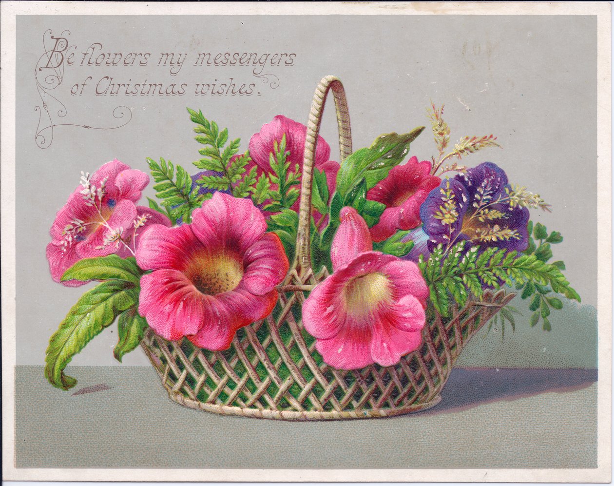 Ett viktorianskt julkort med blommor i en flätad korg, ca 1880 (färg litho) av English School