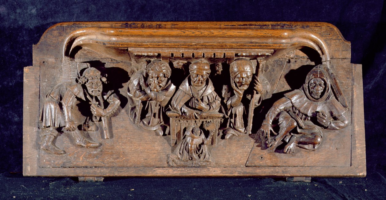 En misericord som föreställer en akademiker som sitter vid ett panelbord och levererar en förmaning till en knästående ångerfull, New College Chapel, Oxford, sent 1300-tal (trä) av English School