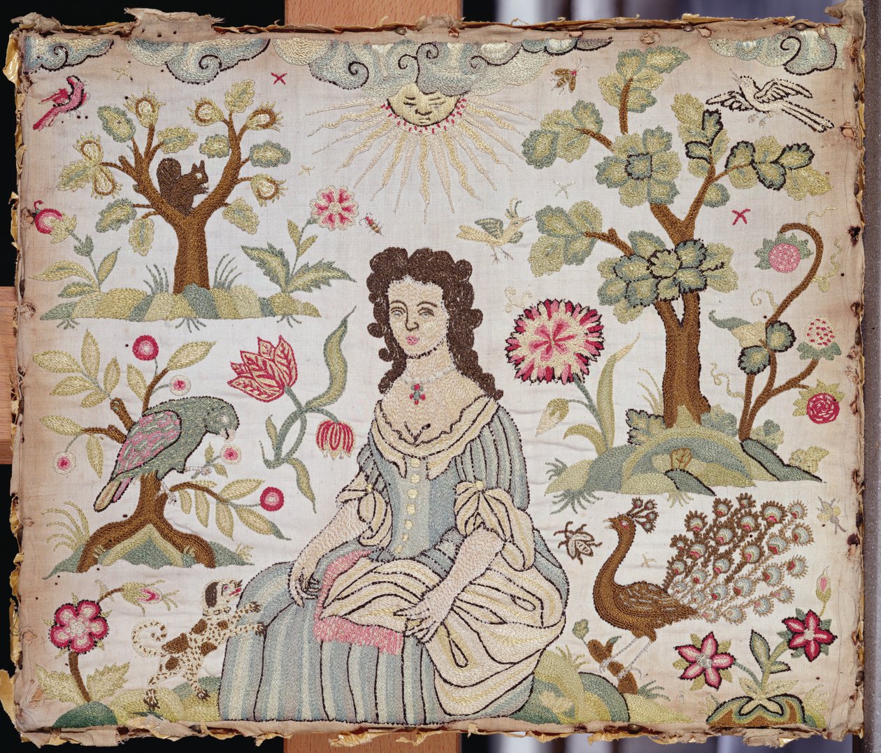 Broderad panel föreställande en dam i en trädgård, ca 1700 (silke) av English School