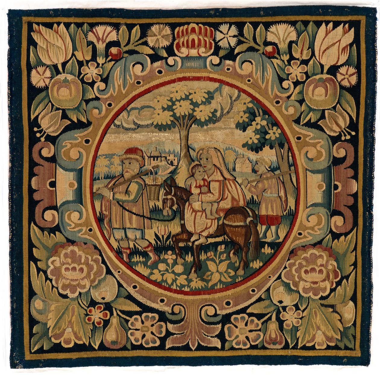 Gobeläng kuddfodral föreställande flygningen till Egypten, möjligen gjort i Sheldon, England, tidigt 1600-tal (ull) av English School