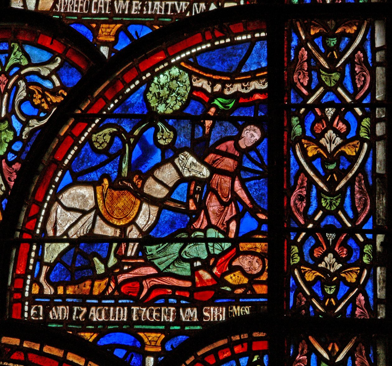 Windows 7 som visar en scen från ett St Thomas Becket Miracle-fönster: William av Gloucester är begravd men hans röst hörs av English School