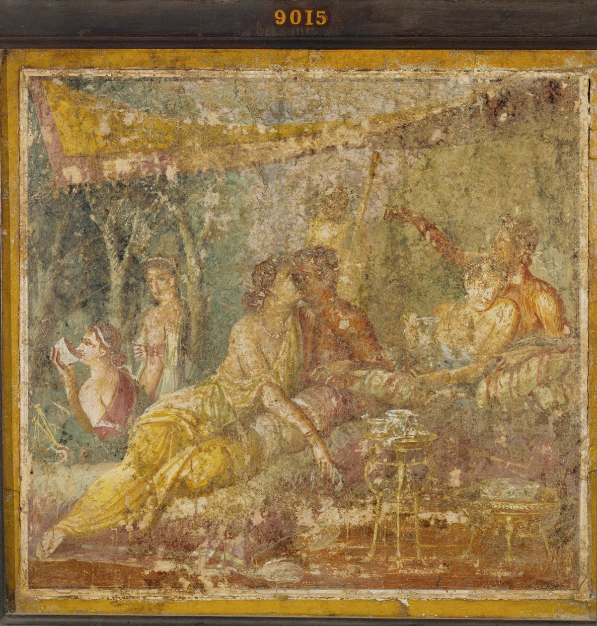 Två par i ett sommar-triclimium av Erich Lessing