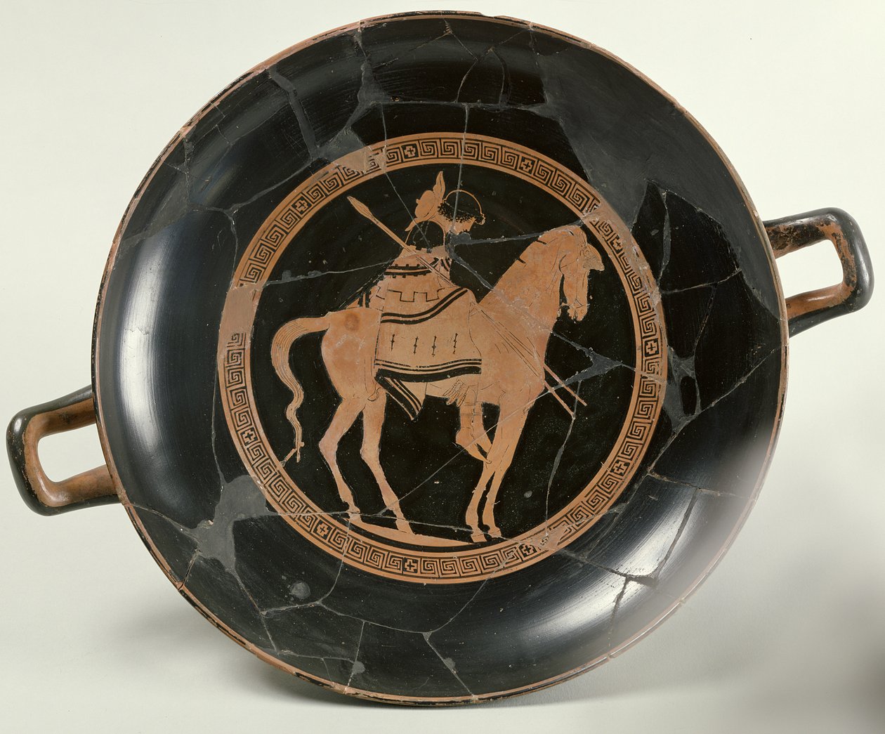 Attic röd-figur kopp föreställande en ryttare till häst (keramik) av Euphronios