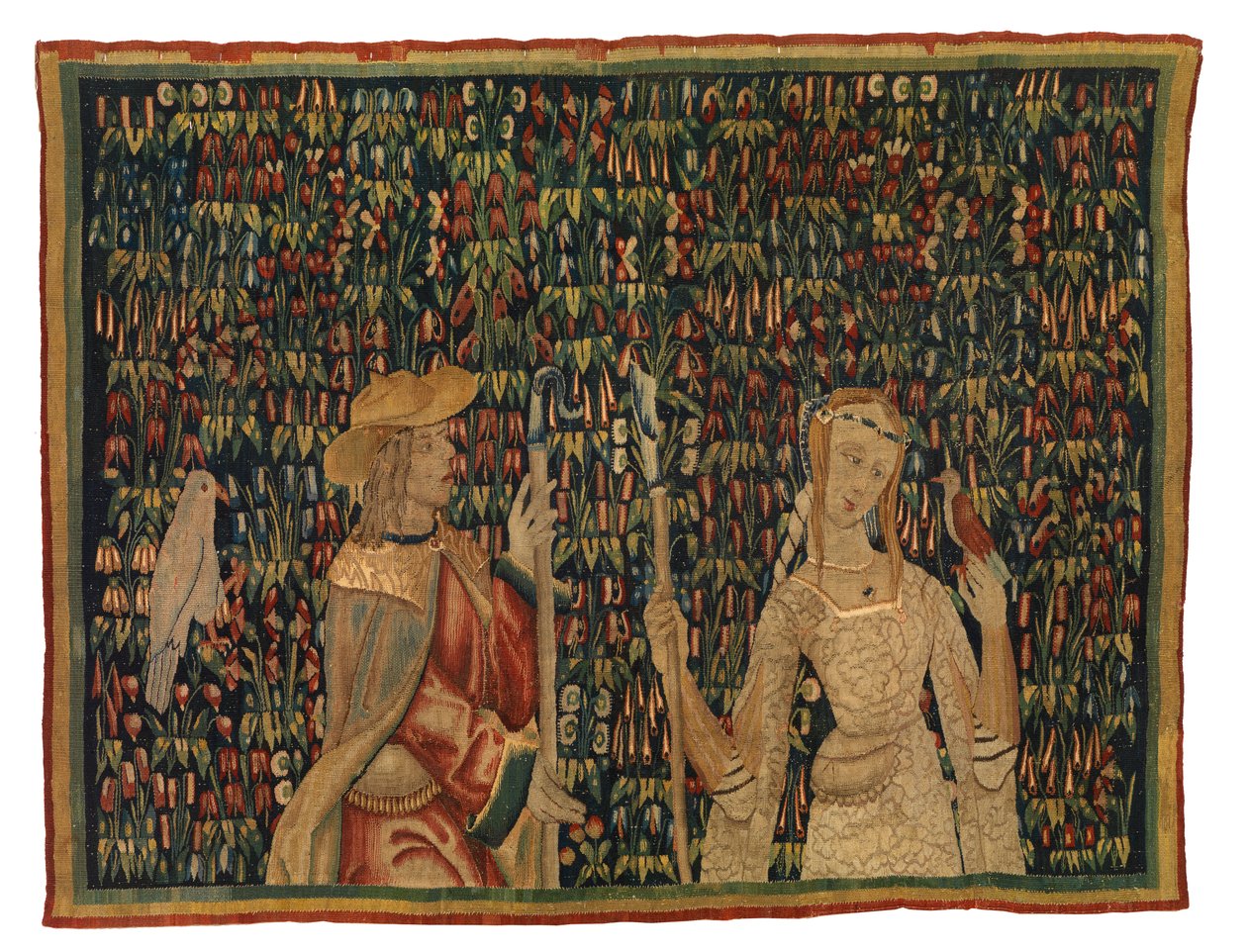 Mille fleurs gobelängfragment som föreställer herde och herdinna eller dam och ungdom (ull och siden) av European School