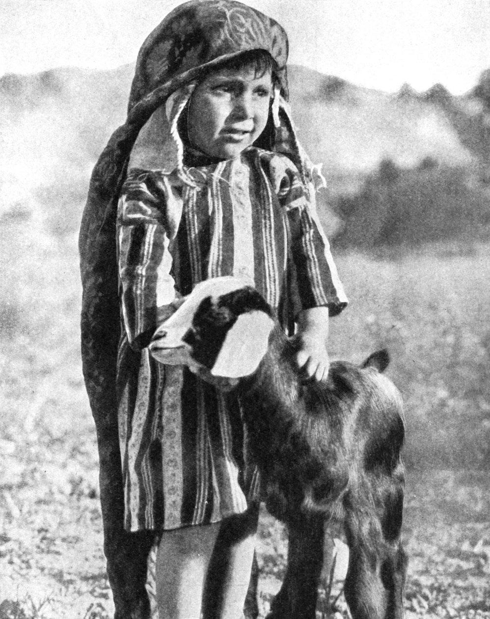 Tunisisk pojke i Saharaöknen, 1936. av Ewing Galloway