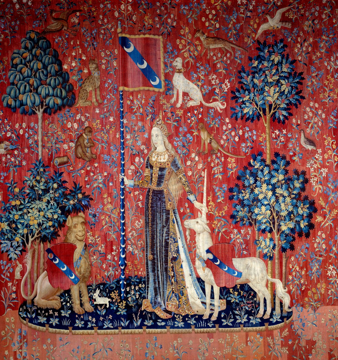 En ung kvinna omgiven av ett lejon, en enhörning, en apa, kaniner) - Tapisseri i ull och silke tillverkad mellan 1484 och 1500, Från slottet i Boussac, Creuse. Sol. 3,7x4,7 m - Paris, musee national du Moyen Ages, Thermes de Cluny - Allegori över beröring  av Flemish School