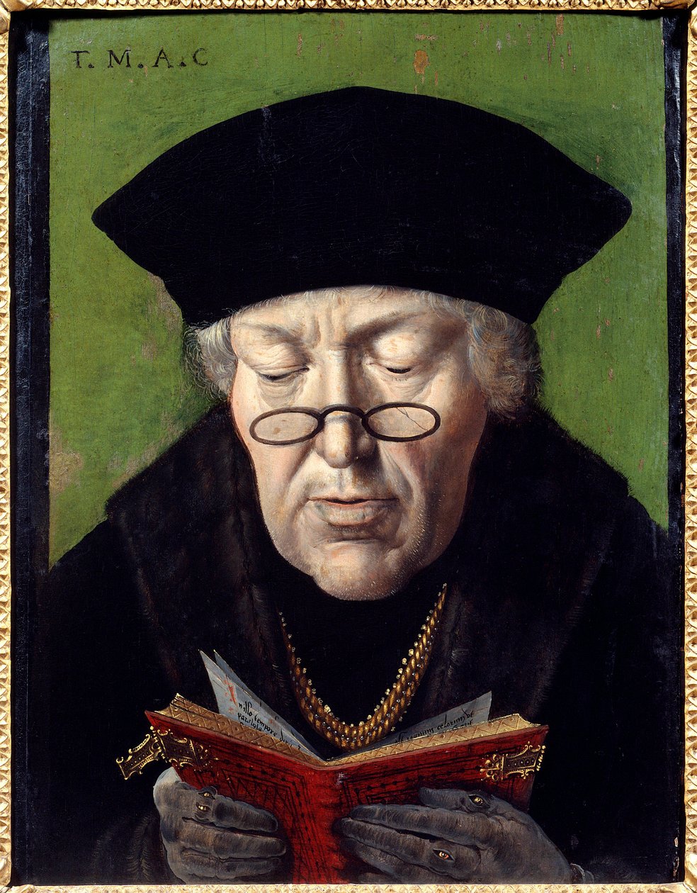 Porträtt av Thomas More (1478-1535), humanist. Humanisten är representerad med glasögon när han läser en bok. Målning av den flamländska skolan av Flemish School