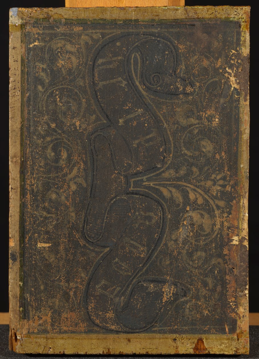 Verso av Annunciation Diptyk med rulla med bokstäver och blommotiv av Francesco di Stefano Pesellino