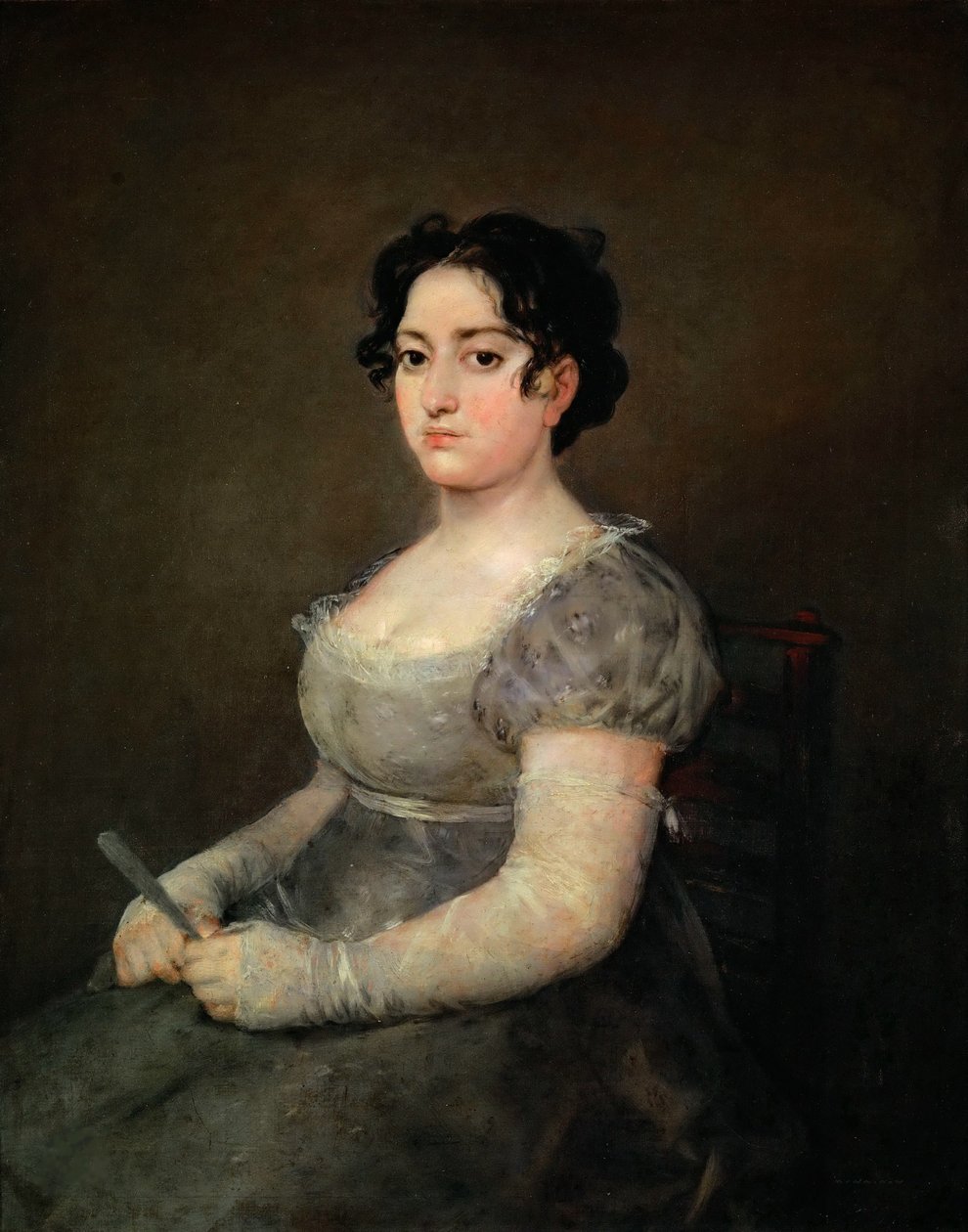 Porträtt av en dam med en solfjäder, 1806-1807. av Francisco Goya de