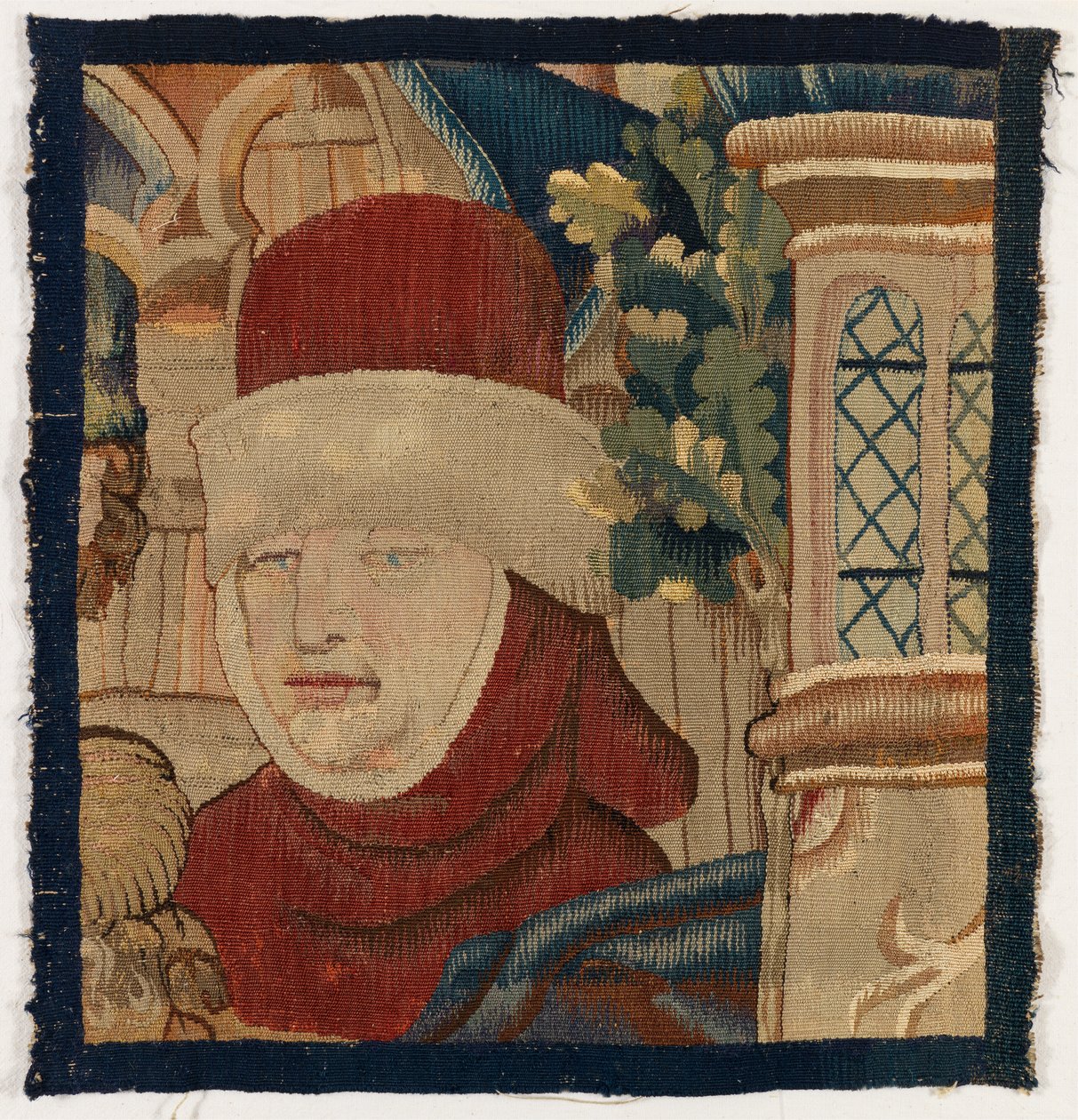 Litet fragment av gobeläng föreställande ett manshuvud, sent 1400-tal (ull) av Franco Flemish School