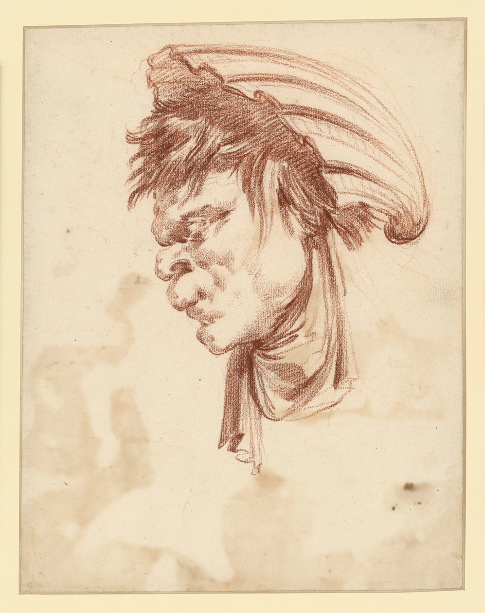 Ett groteskt huvud i profil åt vänster med en mussla som huvudbonad av François Boucher