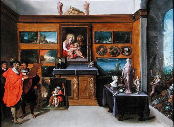En interiör med en samling målningar (olja på panel) av Frans II the Younger Francken