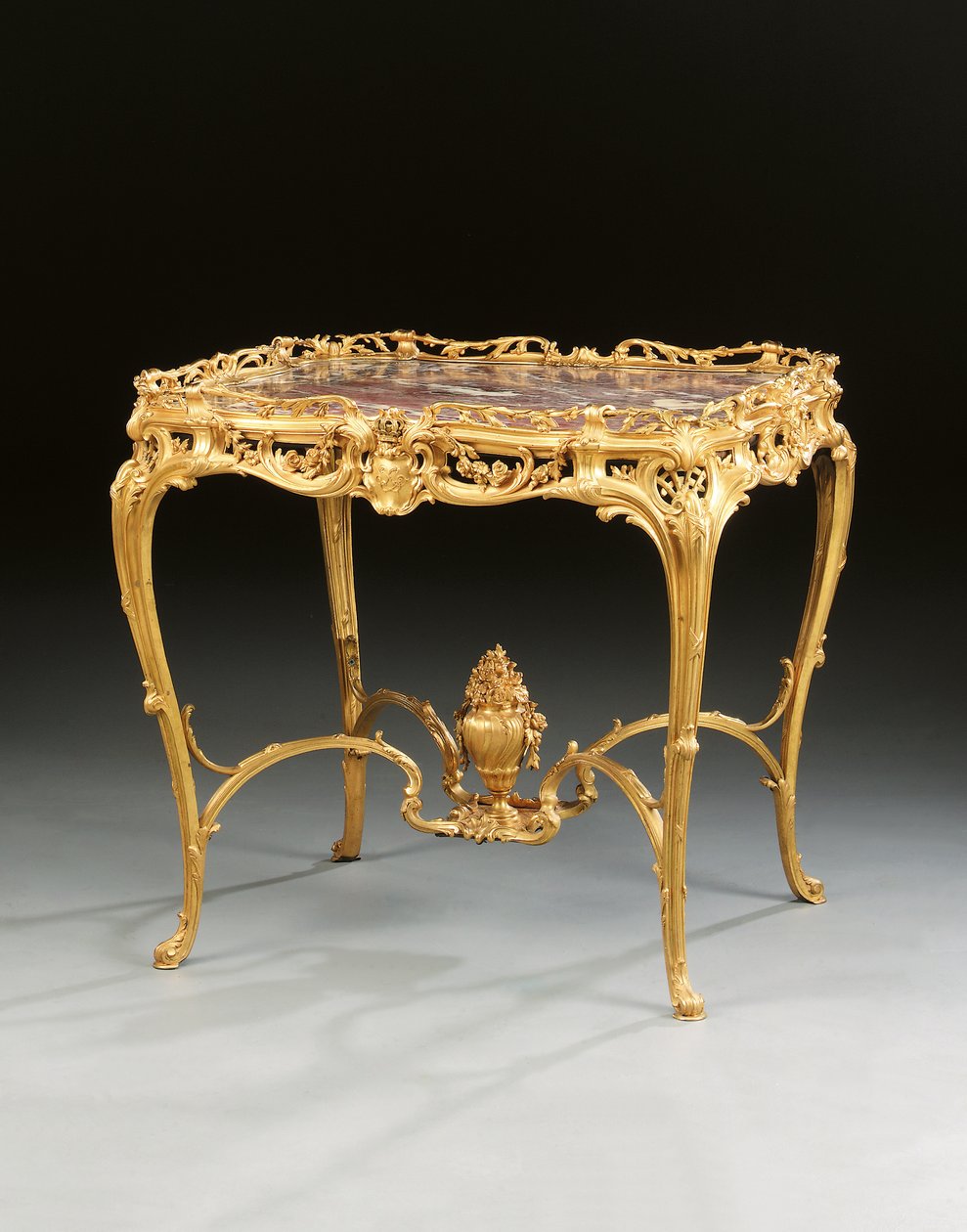 Ett Napoleon III mittbord, av Maison Millet, Paris, ca 1860 (förgylld brons och trä) av French School