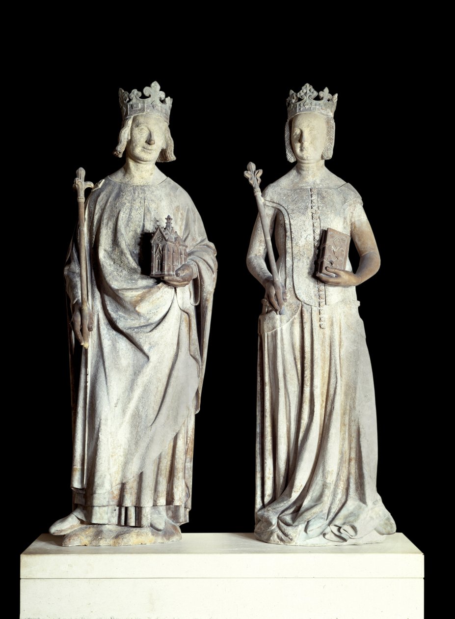 Art France: Statyer av kungen av Frankrike Karl V känd som Karl den vise (1338-1380) och Frankrikes drottning Jeanne de Bourbon (1337-1378). Skulptur i kalksten från 1300-talet. Förmodligen från fasaden på den östra ingången till Louvren (dekor av French School