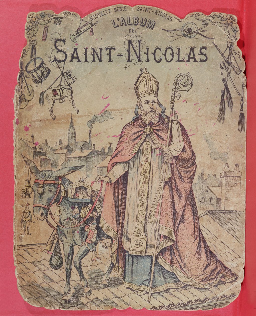 Främre omslag på ett bildalbum som visar St. Nicholas som ger presenter till barnen, sent 1800-tal (färggravyr) av French School