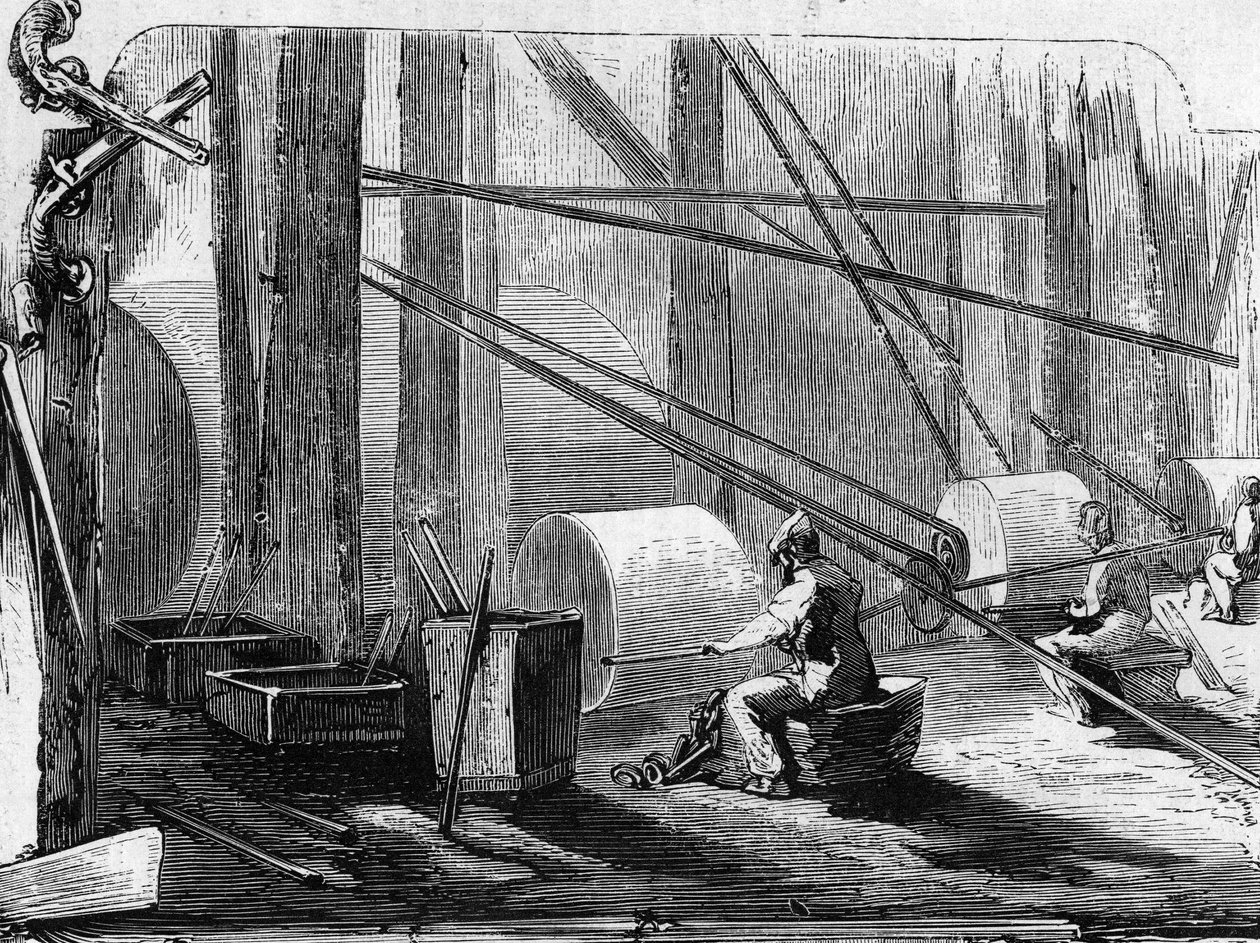 Tillverkning av gevärspistoler: polerjärnscylindrar med stenhjul. Gravyr i "" Le Monde Illustré"" nr 35 av 12 december 1857. av French School