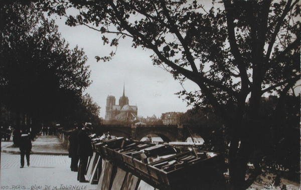 Vykort föreställande Bouquinistes längs Quai de la Tournelle, Paris, ca 1930-40 av French School