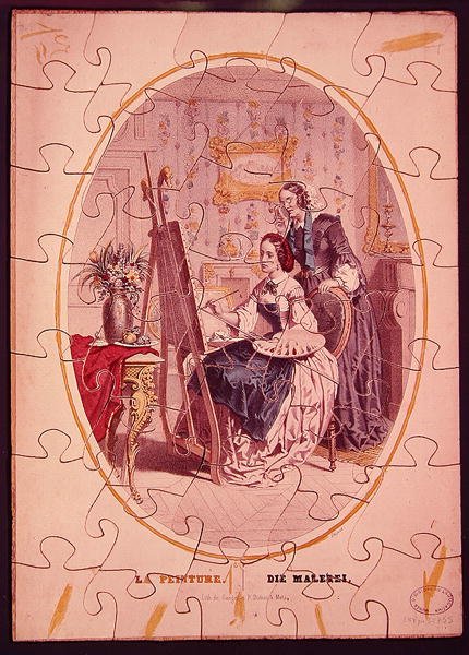 Pusselbitar föreställande en kvinna som målar vid ett staffli, ca 1840-50 (färg litho) av French School