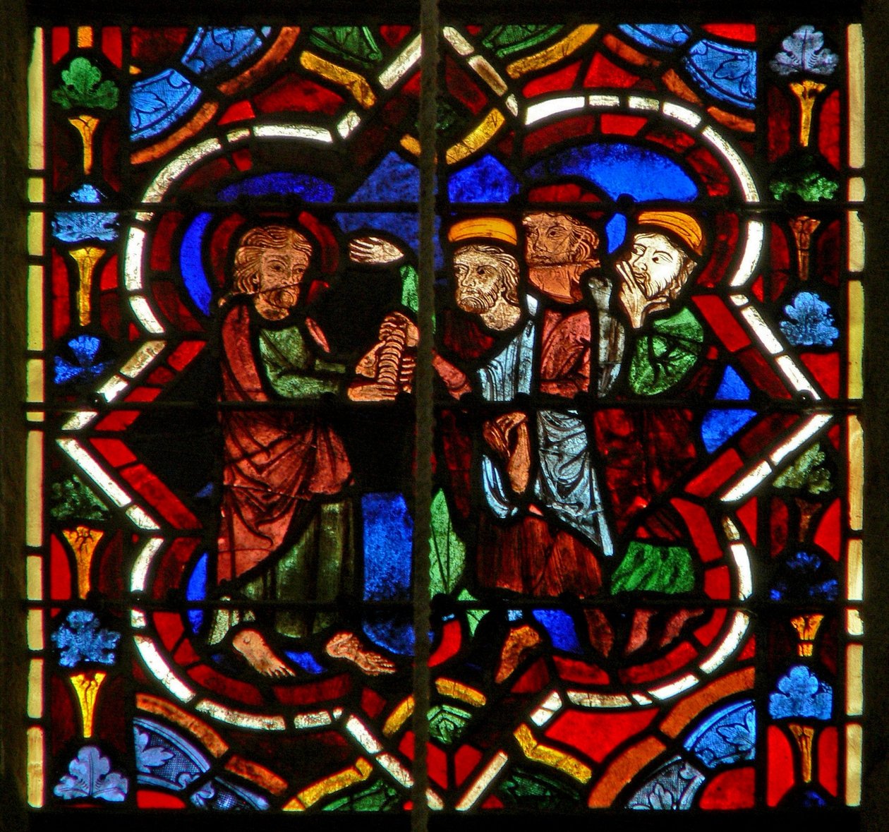 Scen i E-fönstret som föreställer Judas tar emot silvret av French School