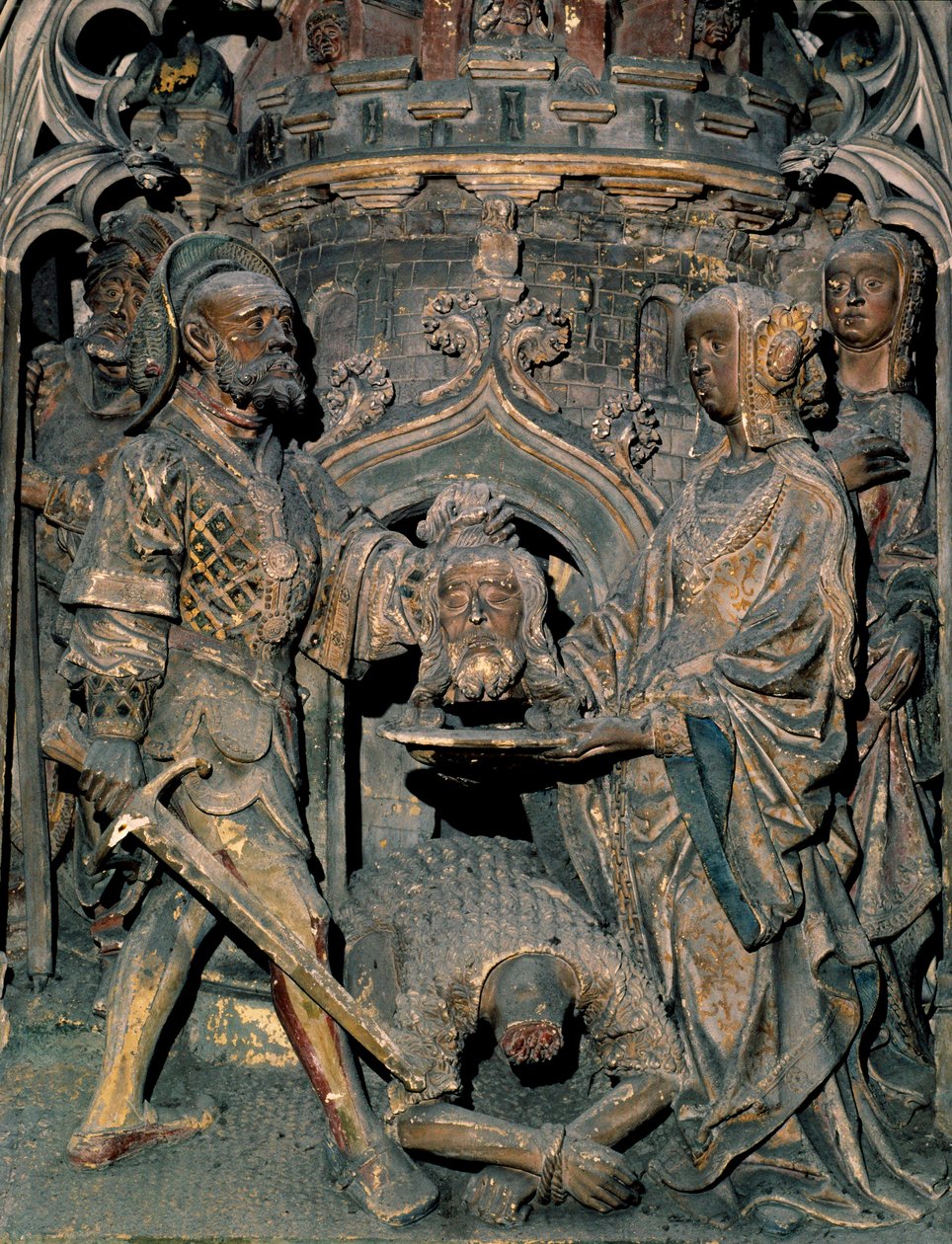 Johannes döparens död Johannes döparens huvud placeras på en platå som Salome presenterar för sin mor. Ristade relief av Cathedrale Notre-Dame d