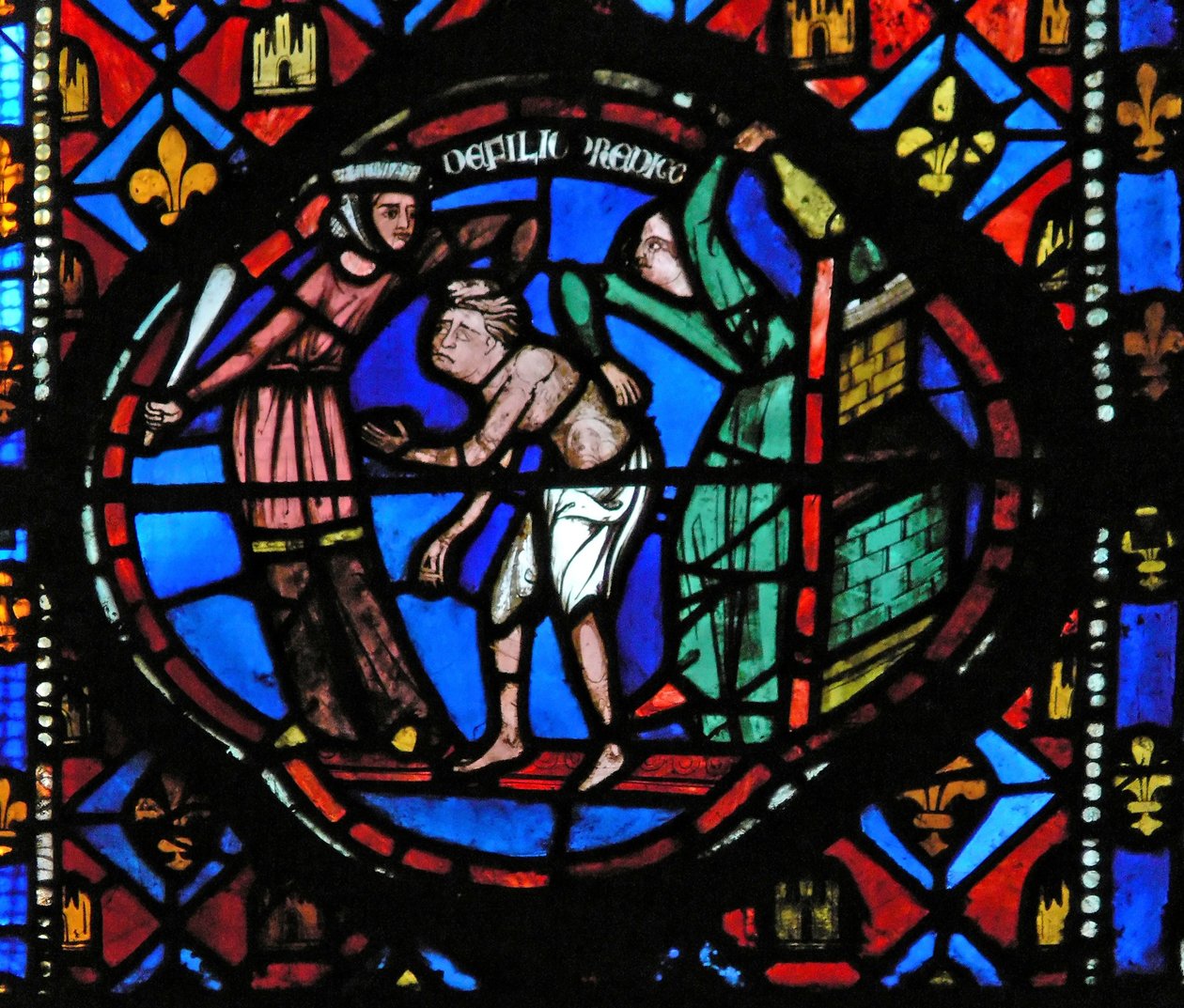 Window Ew-L som skildrar en scen från historien om den förlorade sonen: han kastas ut av coutesanerna av French School