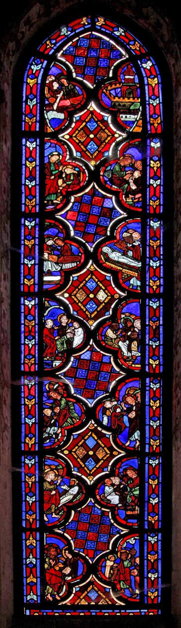 Fönster w1 som visar en scen ur Maria Magdalenas liv med scener ur historien om Maria och Marta av French School