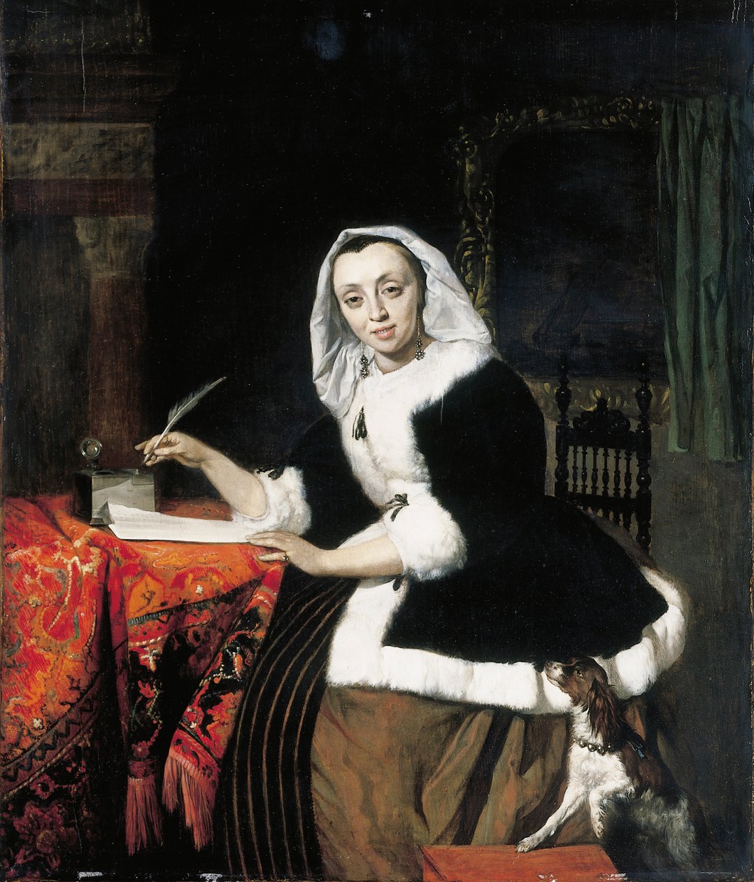 En elegant dam som skriver vid sitt skrivbord, med en hund bredvid sig av Gabriel Metsu