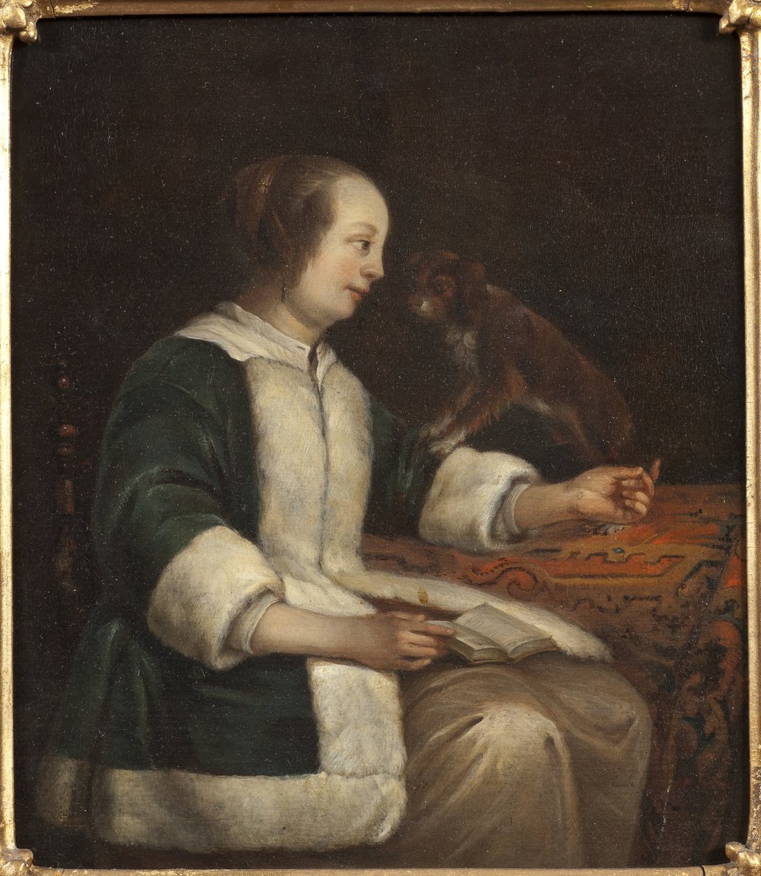 Porträtt av en dam med en hund av Gabriel Metsu