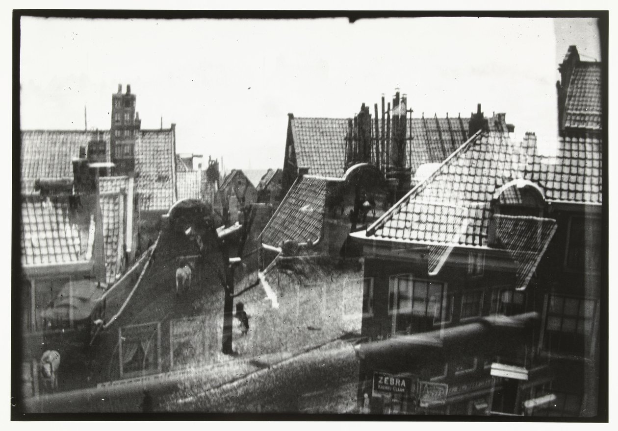 Utsikt över hustaken i Amsterdam av George Hendrik Breitner