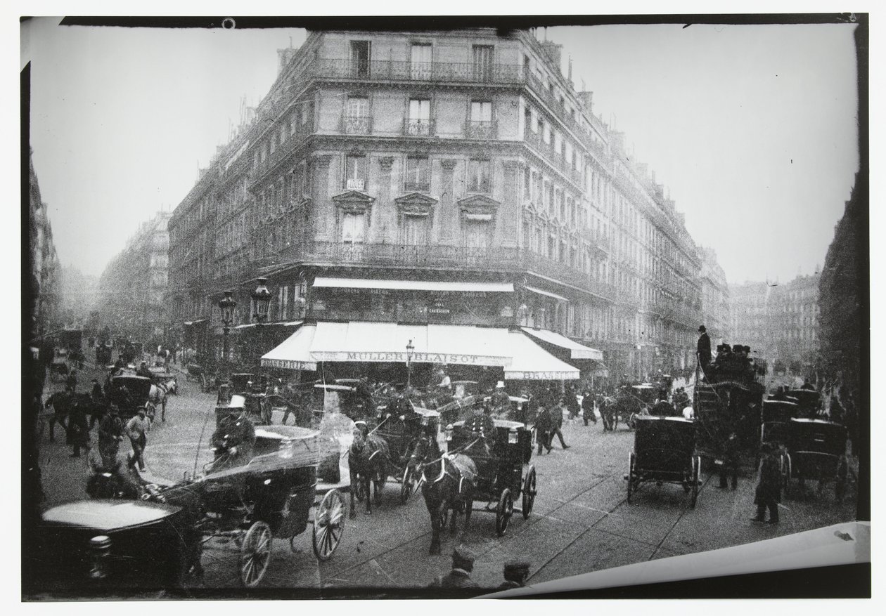 Gatuvy av en upptagen korsning i Paris av George Hendrik Breitner