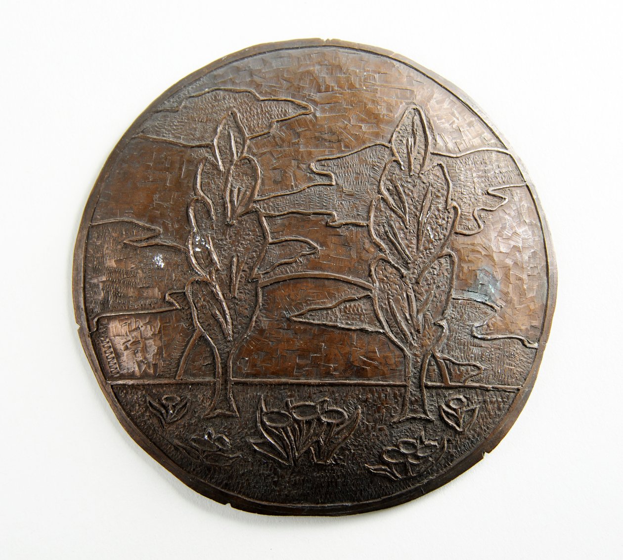 Convex plaque with trees, clouds and flowers (metal) av George James Frampton